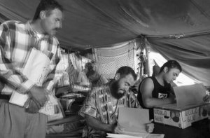 Palestinian prisoners writing their Tawjihi science exams in Ofer military prison, 2004. 