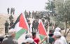Demonstration against the confiscation, settlement, construction and Israe's Wall in the Palestinian village of Bil'in